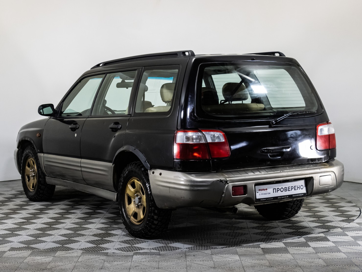 Чёрный Субару Forester 2002 года с пробегом 260000 км. купить в городе  Санкт-Петербург по цене 409000 рублей в автосалонах РОЛЬФ